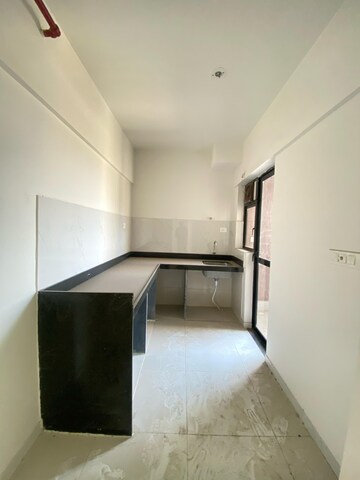 Kitchen in 2 BHK Apartment at Runwal Gardens Phase I, Dombivli East – for Rent