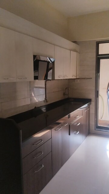Kitchen in 4 BHK Apartment at Cbd Belapur Sector 30 – for Rent