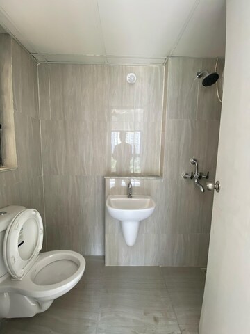 Bathroom in 1.5 BHK Apartment at Runwal Gardens, Dombivli East – for Rent
