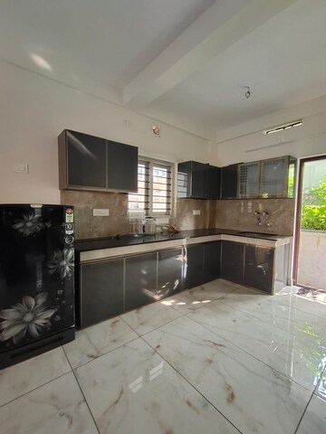 Kitchen in 1.5 BHK Apartment at Kochangadi – for Rent