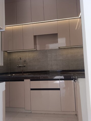 Kitchen in 2 BHK Apartment at Amrapali Golf Homes, Sector 4, Greater Noida – for Rent