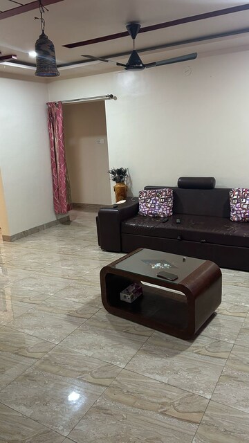 Living Room in 2 BHK Apartment at Eden Park, Viman Nagar – for Rent