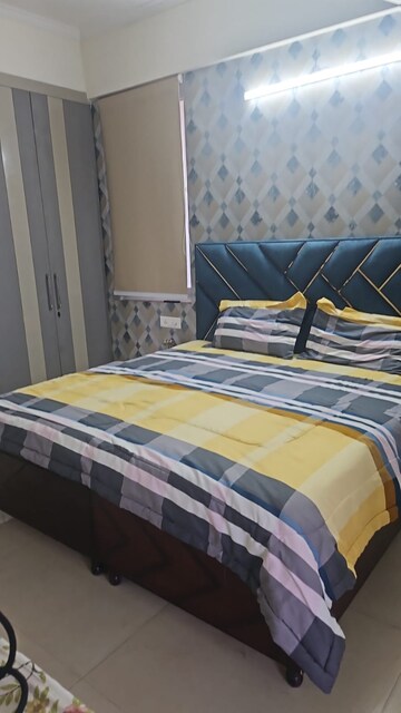 Bedroom in 3 BHK Apartment at Affinity Greens, International Airport Road – for Rent