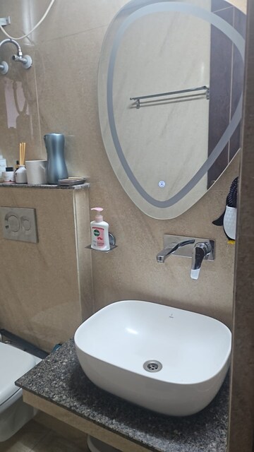 Bathroom in 3 BHK Apartment at Affinity Greens, International Airport Road – for Rent