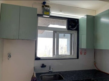 Kitchen in 2 BHK Apartment at Ashar Axis, Majiwada – for Rent