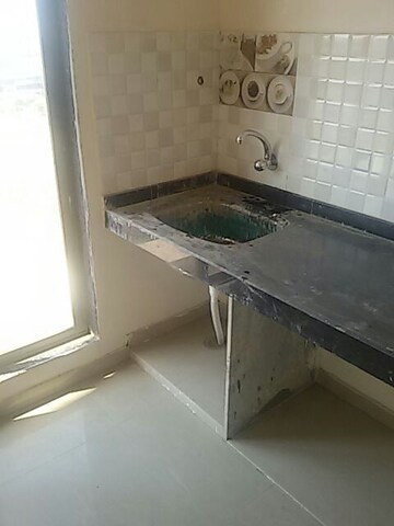 Kitchen in 1 BHK Apartment at Saar Heritage Castle, Taloja – for Sale