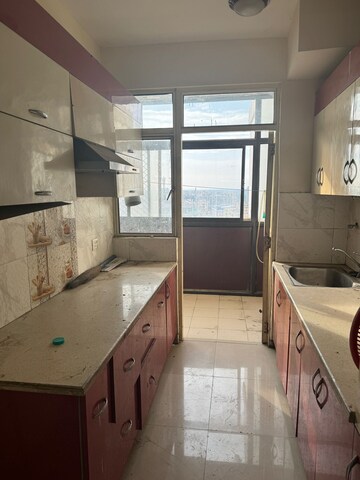 Kitchen in 2 BHK Apartment at Mittal Rajnagar Residency, Raj Nagar Extension – for Rent
