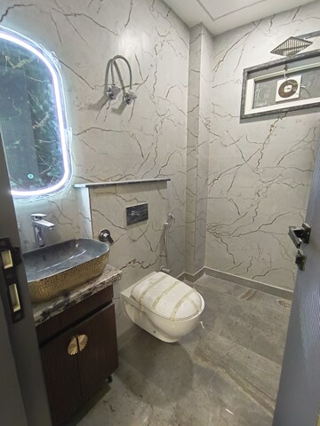 Bathroom in 3 BHK Builder Floor at Mansarover Garden – for Sale