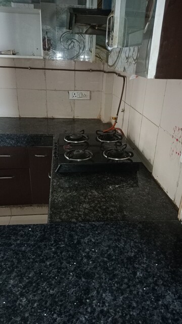 Kitchen in 2 BHK Apartment at Panchsheel Greens, Sector 16 Greater Noida – for Rent