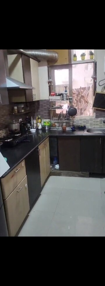 Kitchen in 2 BHK Apartment at Devika Skypers, Raj Nagar Extension – for Rent