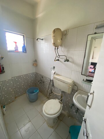 Bathroom in 3 BHK Apartment at Nila Atuulyam, Makarba – for Rent