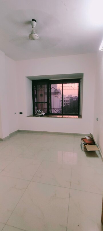 Room in 2 BHK Apartment at Vini Garden, Borivali West – for Rent