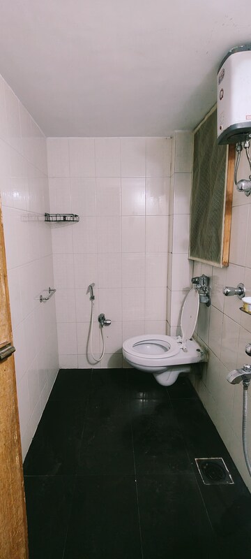 Bathroom in 2 BHK Apartment at Vini Garden, Borivali West – for Rent