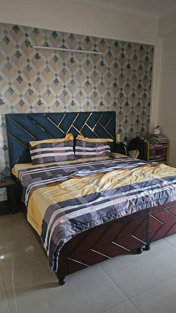 Bedroom in 3 BHK Apartment at Affinity Greens, International Airport Road – for Rent