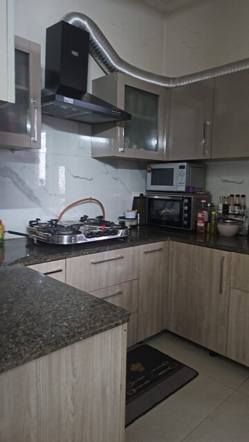 Kitchen in 3 BHK Apartment at Affinity Greens, International Airport Road – for Rent