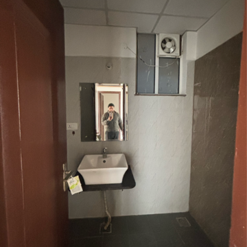 Bathroom in 3 BHK Apartment at Sushma Crescent, Dhakoli Village – for Rent