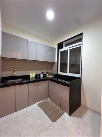 Kitchen in 3 BHK Apartment at Poddar Harmony, Chembur – for Sale