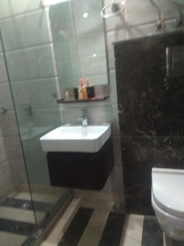 Bathroom in 4 BHK Builder Floor at Maharani Bagh – for Rent