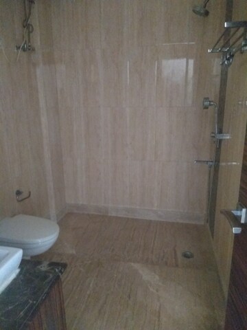 Bathroom in 4 BHK Builder Floor at Maharani Bagh – for Rent