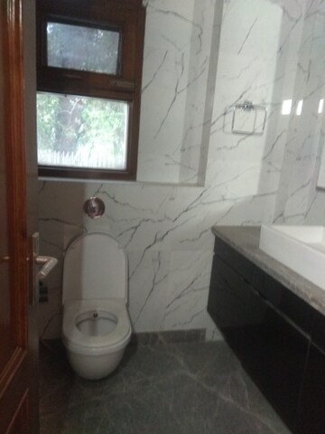 Bathroom in 4 BHK Builder Floor at Maharani Bagh – for Rent