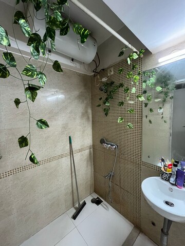 Bathroom in 2 BHK Apartment at Dedhia Palatial Height, Powai – for Rent