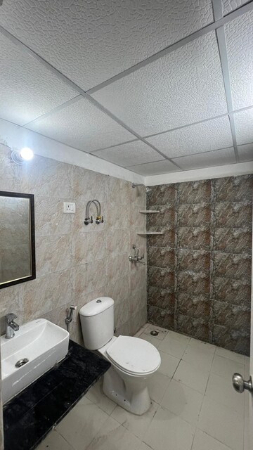Bathroom in 3 BHK Apartment at Nimbus The Hyde park, Sector 78 – for Rent