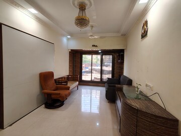 Living Room in 1 BHK Apartment at Riddhi Garden, Malad East – for Rent