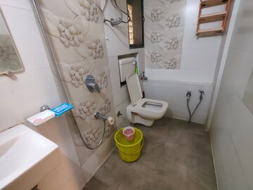Bathroom in 1 BHK Apartment at Riddhi Garden, Malad East – for Rent