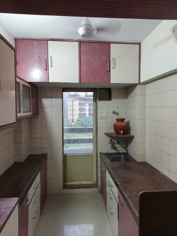 Kitchen in 2 BHK Apartment at Shanti Gardens , Mira Road – for Rent