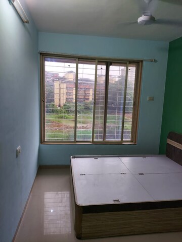 Bedroom in 2 BHK Apartment at Shanti Gardens , Mira Road – for Rent