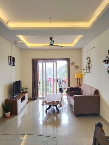 Living Room in 3 BHK Apartment at Indiabulls Greens, New Panvel – for Rent