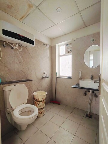 Bathroom in 3 BHK Apartment at International Airport Road – for Rent