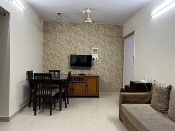 Living Room in 1 BHK Apartment at Silver Tower, Kandivali East – for Rent