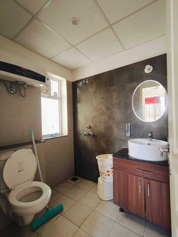 Bathroom in 3 BHK Apartment at International Airport Road – for Rent