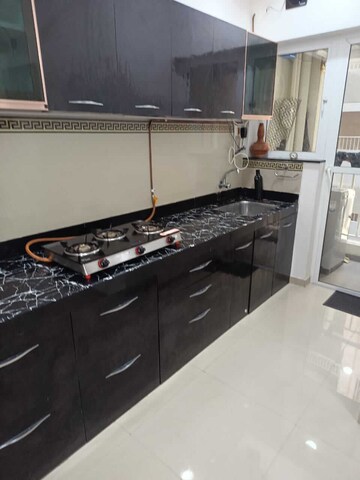 Kitchen in 2 BHK Apartment at Godrej Greens, Undri – for Rent
