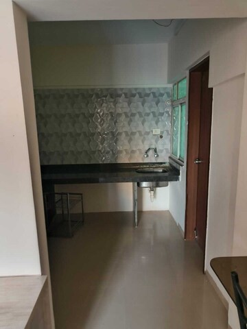 Kitchen in 2 BHK Apartment at Mantra Ira, Undri – for Rent