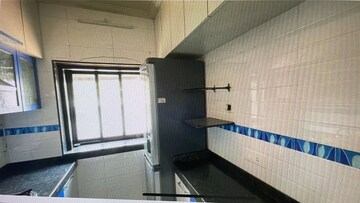 Kitchen in 2 BHK Apartment at Yashodham Complex, Goregaon East – for Sale