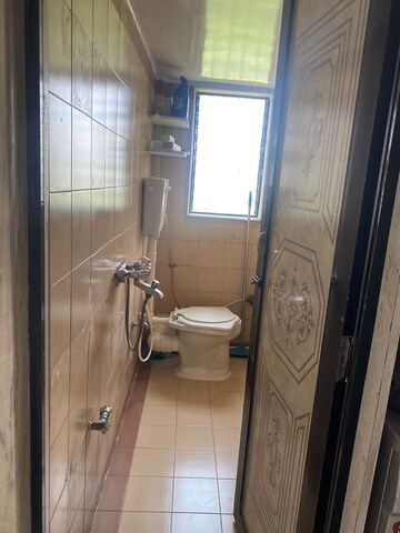 Bathroom in 2 BHK Apartment at Mahim Landmark, Mahim – for Rent
