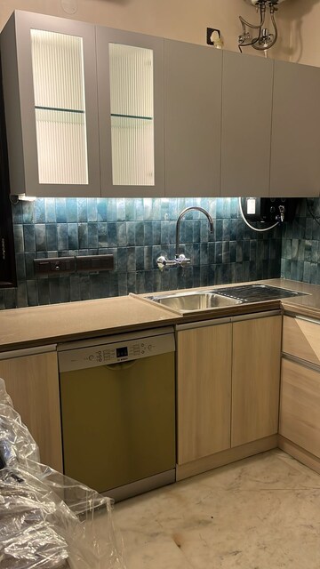 Kitchen in 4 BHK Apartment at Jor Bagh – for Rent