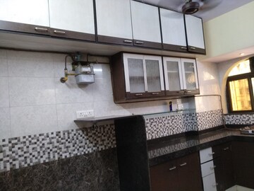 Kitchen in 2 BHK Apartment at Green Fields Apartment, Andheri East – for Rent