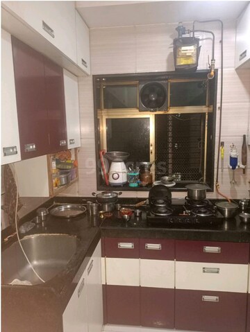 Kitchen in 2 BHK Apartment at Vasant Sarita, Kandivali East – for Rent