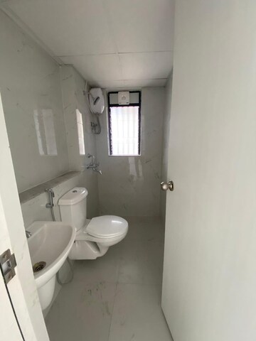 Bathroom in 2 BHK Apartment at Runwal Gardens Phase 2, Dombivli East – for Rent