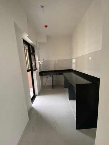 Kitchen in 2 BHK Apartment at Runwal Gardens Phase 2, Dombivli East – for Rent