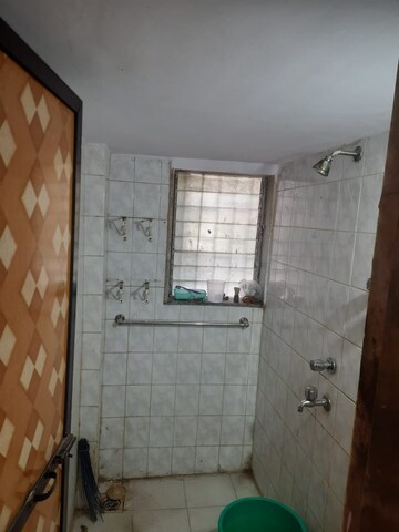 Bathroom in 1 BHK Apartment at Mira Nagar – for Sale