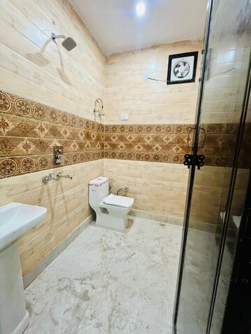 Bathroom in 3 BHK Builder Floor at Dwarka Mor – for Rent