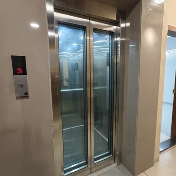 Building Lobby in 1 BHK Apartment at Wadgaon Sheri – for Rent