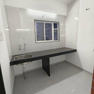 Kitchen in 1 BHK Apartment at Wadgaon Sheri – for Rent