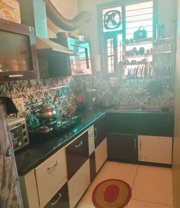 Kitchen in 3 BHK Builder Floor at Dhakoli Village – for Sale