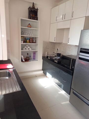 Kitchen in 4 BHK Builder Floor at DLF Garden City Independent Floors, Sector 92 – for Rent