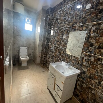 Bathroom in 3 BHK Builder Floor at Khirki Extension – for Rent